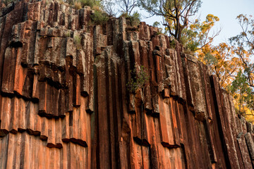 Organ piping columnar basalt rock formation. Sawn Rocks at Mt. Kapatur National Park near Narrabri, NSW, Australia. Rare hexagonal organ piping rock formation - remains of volcanic lava flow