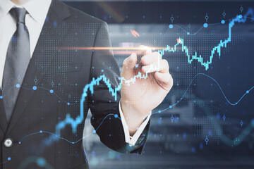 Poster - Business investment and stock market analyzing concept with businessman in black suit touching virtual interface with financial chart diagram and graphs