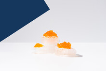Orange Tobiko Caviar Placed On Ice