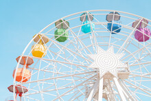 Ferris Wheel Against Blue Sky
