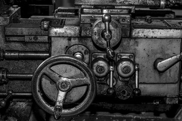 Wall Mural -  Metalworking workshop, metal processing machines.  Vintage Industrial Machinery in a old factory - black and white photo