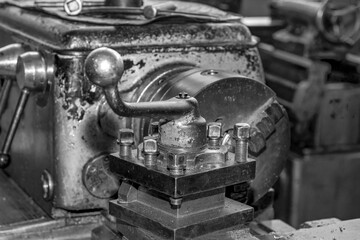 Wall Mural -  Metalworking workshop, metal processing machines.  Vintage Industrial Machinery in a old factory - black and white photo