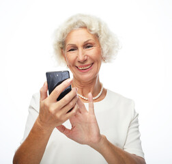 Old woman watching funny videos on internet.