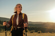 © bernardbodo - Beautiful female hiker on adventure looking at the distance