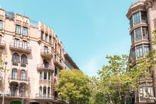Classic Apartment Building With Balconies And Shutters In Barcelona