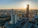 Fototapeta Miasto - Yekaterinburg aerial panoramic view in spring at sunset. Yekaterinburg city and pond in spring or autumn.