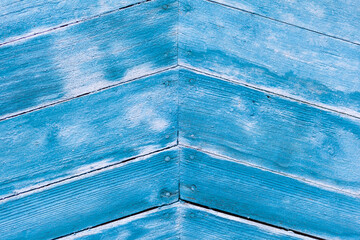 Poster - Wood texture with blue flaked paint. Peeling paint on weathered wood. Old cracked paint pattern on rusty background. Chapped paint on an old wooden surface