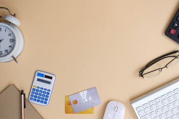Poster - Office desk with smartphone, laptop computer, cup of coffee, and office tools. Flat lay, top view with copy space. A bank notepad and a pen are on top of an office desk table containing computer tools