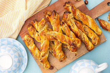 Wall Mural - Sweet puff pastry swirls with walnuts and sugar