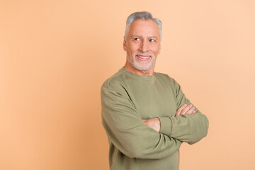 Sticker - Profile side photo of senior cheerful man folded hands wonder look empty space isolated over beige color background