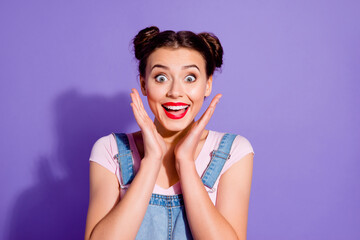 Sticker - Photo of astonished overjoyed girl raise arms palms near face isolated on violet color background