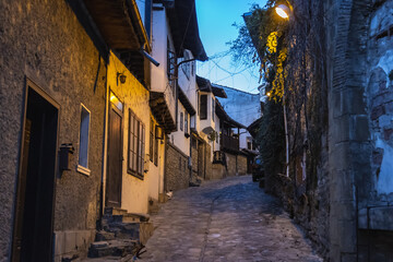 Sticker - Narrow street in old part of Veliko Tarnovo city, Bulgaria