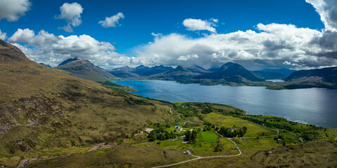 Wall Mural - Aerial view of the landscape surrounding Diabaig, Lower Diabaig and Torridon village in the north west highlands of Scotland during summer on a blue sky day with light clouds