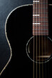 © hurricanehank - Beautiful black acoustic guitar. Professional musical instrument for guitarist