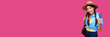 © khmelev - Smiling caucasian woman holding credit card isolated on pink background. Online shopping, e-commerce, internet banking, spending money, enjoying life concepts