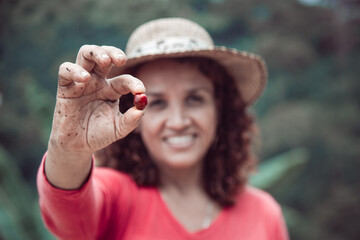 Wall Mural - Woman in her coffee farm in the country of Colombia