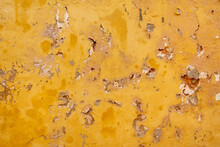 Old Worn Yellow Cement Wall