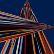 Abstract illustration featuring overlapping converging slashes of red, white, yellow, orange and blue, on a deep blue background