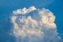 Majestic Big And Fluffy Cumulonimbus Cloud In The Blue Sky Before BIG Storm.Summer Environment Concept.