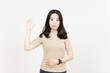 © Sino Images Studio - Swearing or Promise Gesture Of Beautiful Asian Woman Isolated On White Background