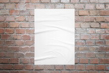 Poster Mockup On Brick Wall With Crumpled Texture
