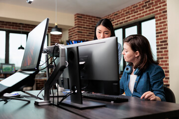 Poster - Design company employee requesting help from production department team leader while in office. Digital artist asking for help to coworker regarding project while in modern workspace.