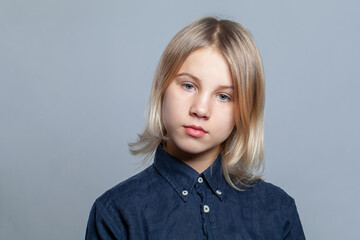 Cute teen girl face, studio portrait