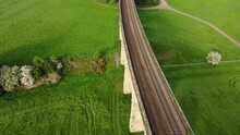 View Over Arthington Viaduct Train Tracks And Fields Near Harrogate In The Yorkshire Countryside. Drone Aerial