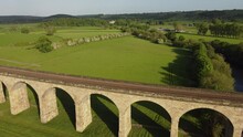 Railway Train Tracks Of Arthington Viaduct And Fields Near Otley In The Yorkshire Countryside. Drone Aerial View