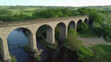Panorama View Along Arthington Viaduct, River And Fields Near Otley In The Yorkshire Countryside. Drone Aerial