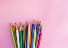 Colorful Pencils With Copy Space On Pink  Background 
