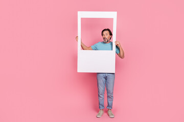 Sticker - Full body portrait of puzzled person hold paper album set card isolated on pink color background