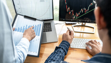 Aufkleber - Business trader team checking stock market online analyzing graph data on laptop screen to brainstorming about trading online while working together in office
