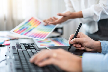 Aufkleber - Two creative graphic designer team working on color selection and drawing on graphic tablet, Color swatch samples chart for selection coloring in inspiration to creativity at workplace