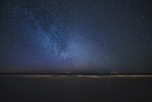 Real Photo Of The Milky Way Galaxies In The Night Sky. Background Of A Starry Sky In Summer. Infinity Space Texture.
