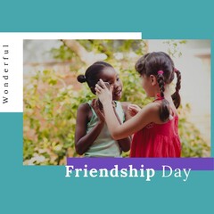 Wall Mural - Wonderful friendship day text over two diverse girls using smartphone against blue background