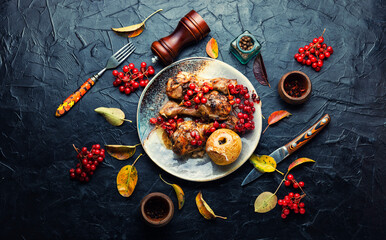 Wall Mural - Chicken drumsticks with viburnum,top view