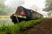 Moored Narrow Boat In The Mist.