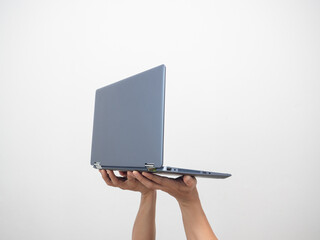 Side view hand holding laptop isolated white