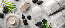 Spa Treatment Items - Hot Massage Stones With Salt And Oils On Marble Table. Top View Banner