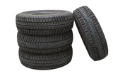 Fototapeta  - winter tires on a white background,set of new tires isolated on white background