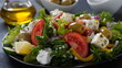 Greek salad. Fresh vegetable salad with tomato, onion, cucumbers, sweet pepper, olives, olive oil, lettuce, red onion, and feta cheese.