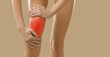 Banner wide shot of woman legs on yellow background with spasm in kneecap. Acute pain in knee concept. Unhealthy female suffer from arthrosis or osteoarthritis. Healthcare concept.