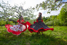 Gypsy Girls Dancing In The Orchard