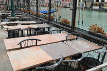 Empty Tables And Chairs Of The Closed Alfresco Restaurant Without People During The Terrible Lockdown Caused By The Corona Virus In Venice In Italy In Europe