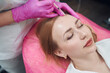 © Svitlana - Female lying on cosmetology chair and receiving beauty injections