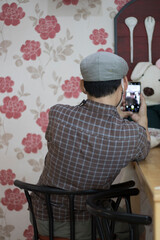 person man enjoying taking a selfie at the cafe.