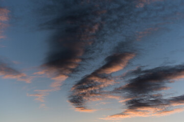 Wall Mural - twilight sky with effect of light pastel colors. colorful sunset of soft clouds.