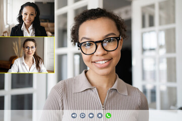 Sticker - Communication online video call of a female colleague, a woman looks into the camera smiling
