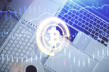 Poster - Blockchain theme hologram drawings over computer on the desktop background. Top view. Double exposure.